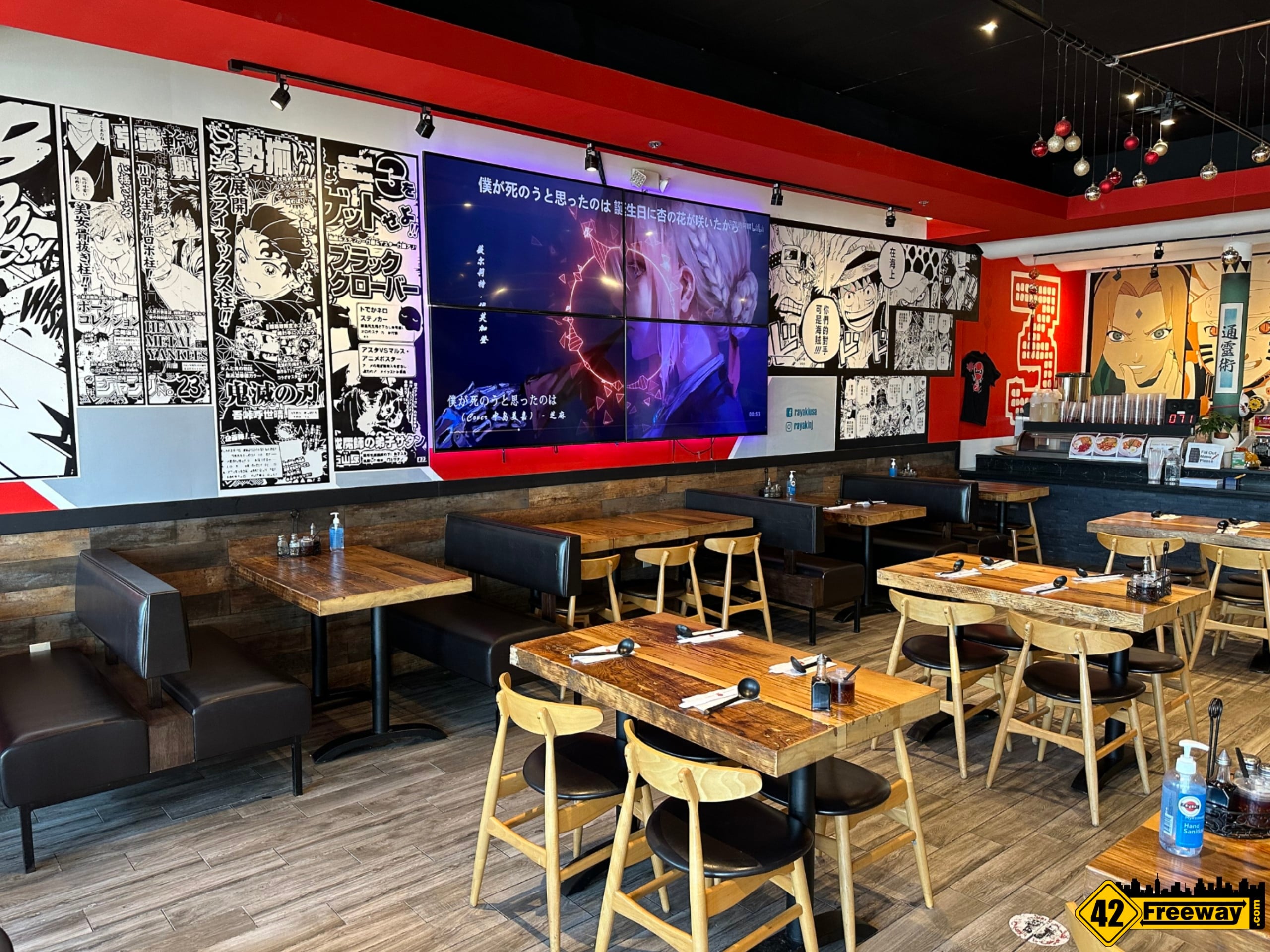 Anime artwork and dining atmosphere at RAYAKI Glassboro